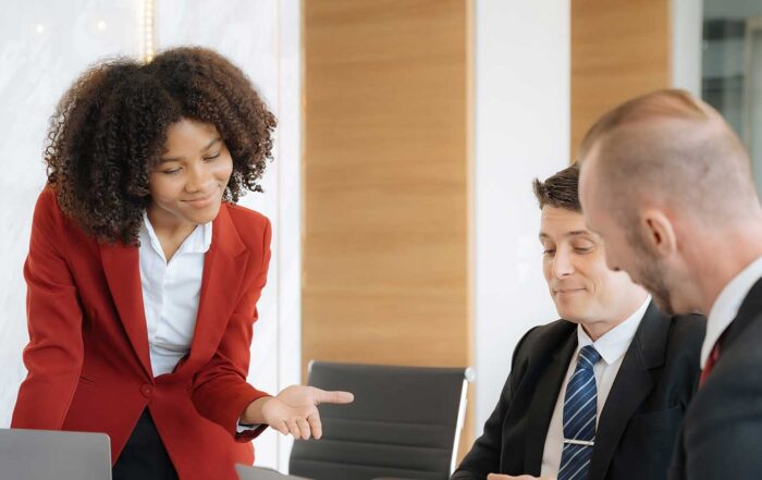 Photo of workforce planning consultant sharing her proposal with client