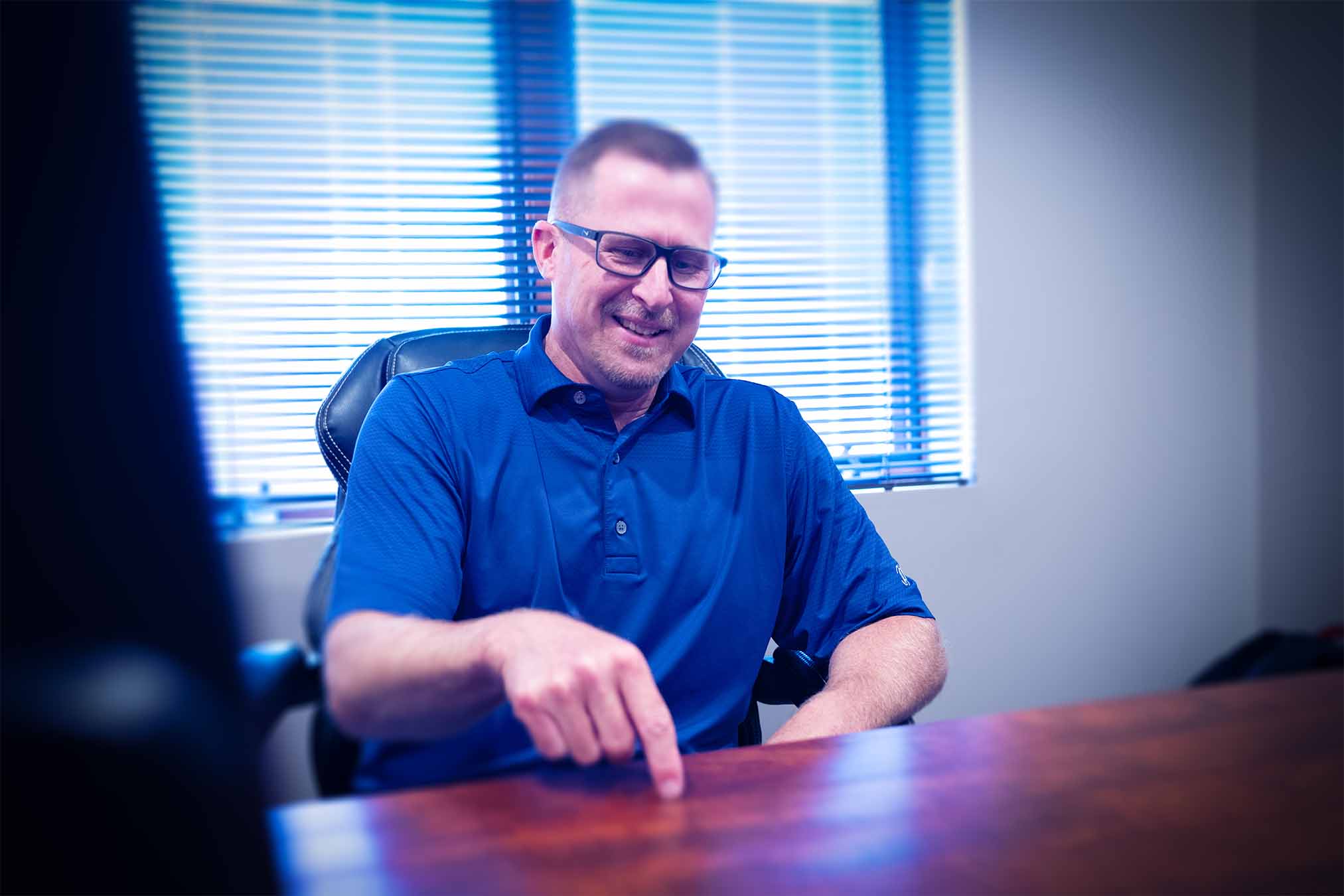 Garnet River President Scott Card talking during a meeting.